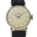 International Watch Company (IWC) women's watch, stainless steel, hand-wound, analog display, silver dial.