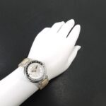 Louis Vuitton Tambour Moon Dual Time MM GMT QA108 Ladies' with 12 Diamond Lugs Black Diamonds Silver Quartz Movement. - Image 4